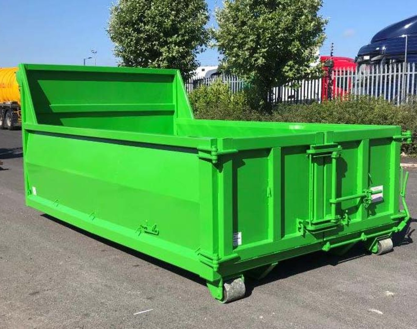 Roll off dumpster being delivered to a construction site in Kingston, Jamaica